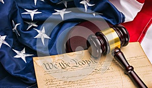 American Constitution - We the people with USA Flag and judge gavel