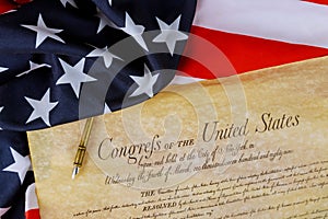 American constitution of the United States of America on close up on American flag