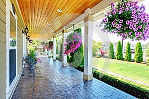 American Country farm luxury house with porch.