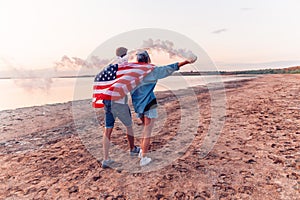 American couple with hand flare or fusee