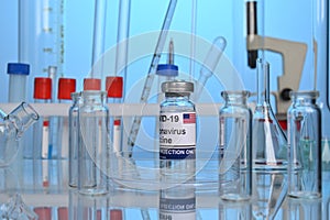 American Covid-19 Vaccine Vial on a Lab Desk