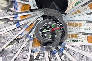 American dollar banknotes with compass.