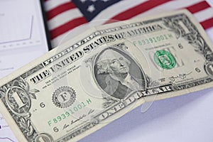 1 american dollar bill with united states flag . photo