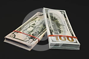 american Dollars banknotes isolated on black background