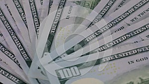 American dollars cash rotating on table
