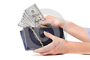 American dollars. Hands taking out money from wallet.