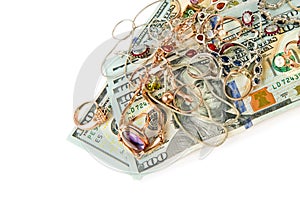 American dollars and jewels isolated on white . There is free space for text