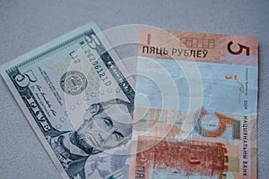 American dollars and Russian rubles. Business concept. Dollar-ruble exchange rate photo