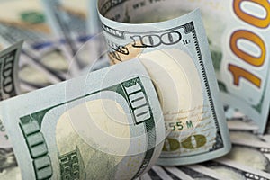 American dollars. A stack of hundred dollar bills. Close up