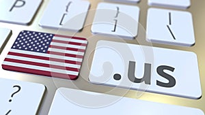 American domain .us and flag of the USA on the buttons on the computer keyboard. National internet related 3D animation