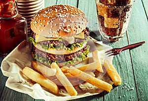 American double cheeseburger with French fries