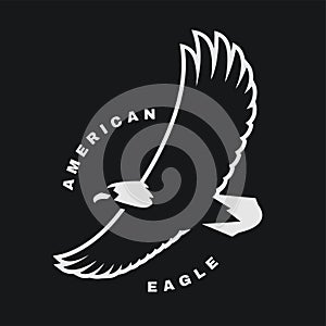 American eagle. Flying bird logo, simbol on a dark background. Vector illustration.