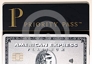 American Express Amex Platinum & Priority Pass Card on a White Table