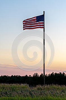 American flag against an evening sky Minnesota, USA