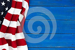 American flag on antique rustic royal blue wooden background