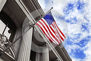 American Flag Blowing in the Wind attached to front of Stone Column Build