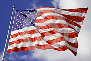 American Flag blows in wind photo