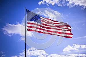 American flag and blue sky