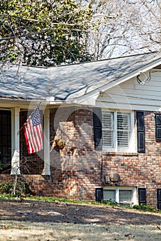 American Flag on Brick Home