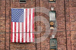 American flag on brick wall