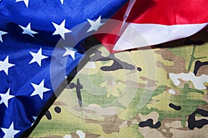 American flag and camouflage. Military background. Copyspace