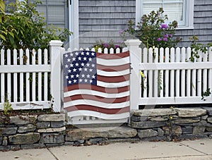 American flag decoration on fence