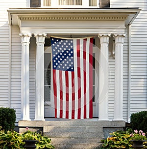 American flag on the door of New England home