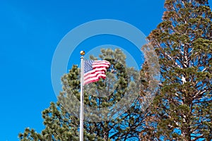 American flag flies over the Capitol or Roundhouse in Santa Fe, New Mexico, USA
