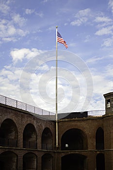 American Flag flying at Fort Point