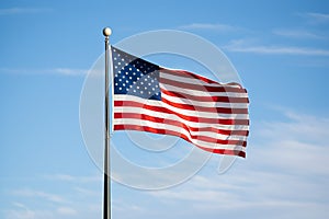 American flag flying at half mast