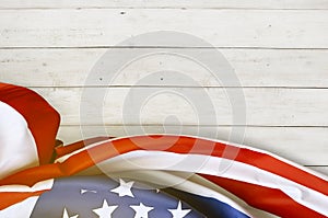 American flag folded on a wooden table