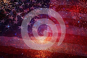 American flag with glitter bokeh background and fireworks