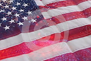 American flag with glitter bokeh background and fireworks