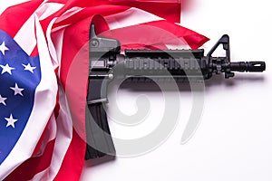 American flag with gun on white background