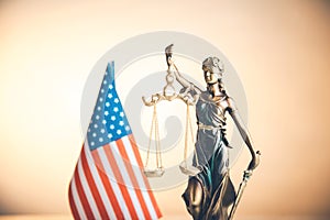 American flag and justice lady on yellow background