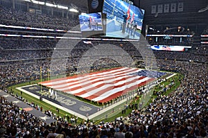 American Flag over Dallas Cowboy Football Field