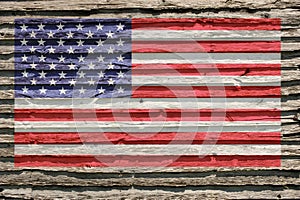 American Flag Overlaid On Old Cabin Siding