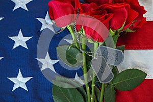 American flag with roses and military dog tags