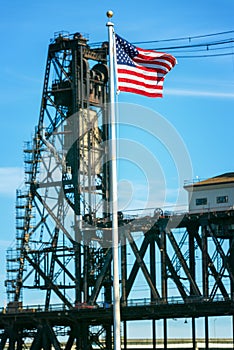 American Flag and Steel Bridge