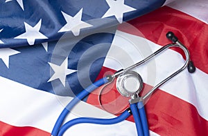 American flag with stethoscope. Medicine and health in USA concept