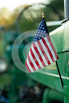 An American flag on a tractor