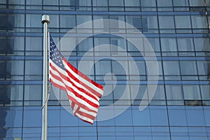 American Flag Waving in the downtown of a major city