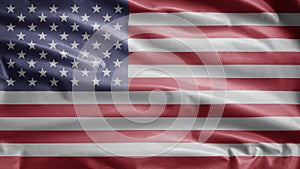 American flag waving in the wind. Close up of USA banner blowing soft silk