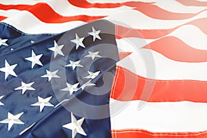 American flag waving in the wind, stars and stripes closeup