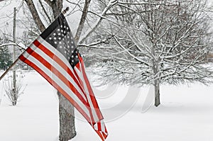 American Flag with winter snow background