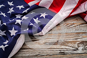 American flag on wood background .