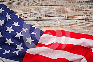 American flag on wood background .