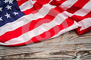 American flag on wood background .