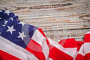 American flag on wood background .