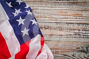 American flag on wood background .